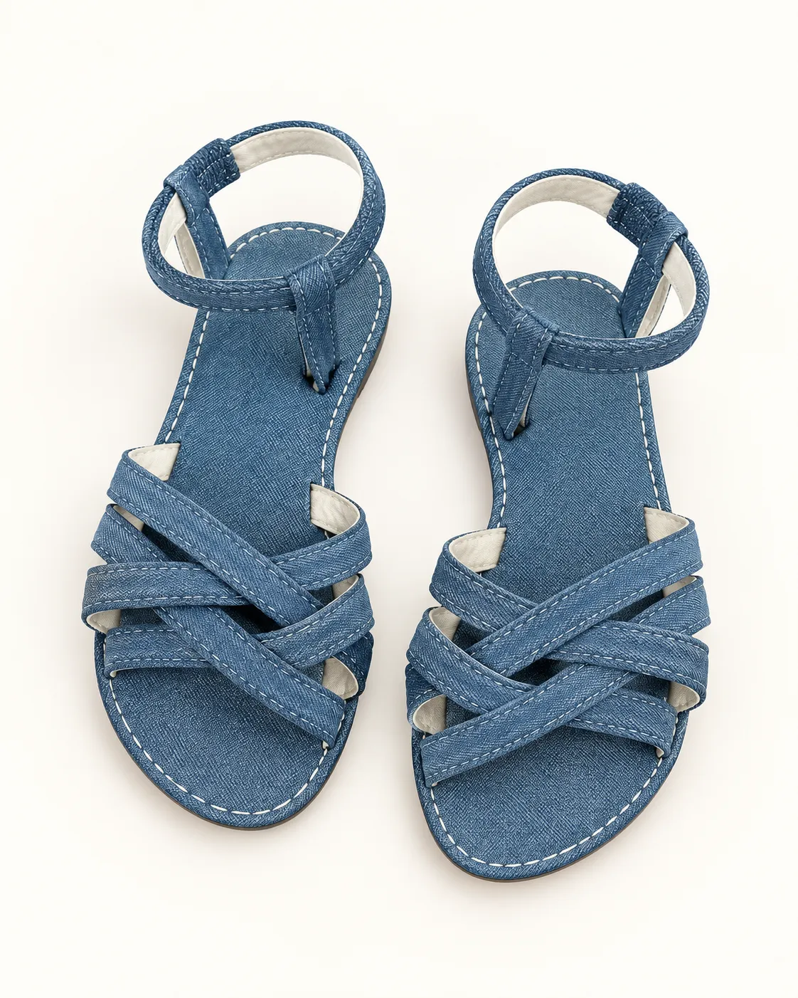 Sandales plates en jean bleu à brides croisées