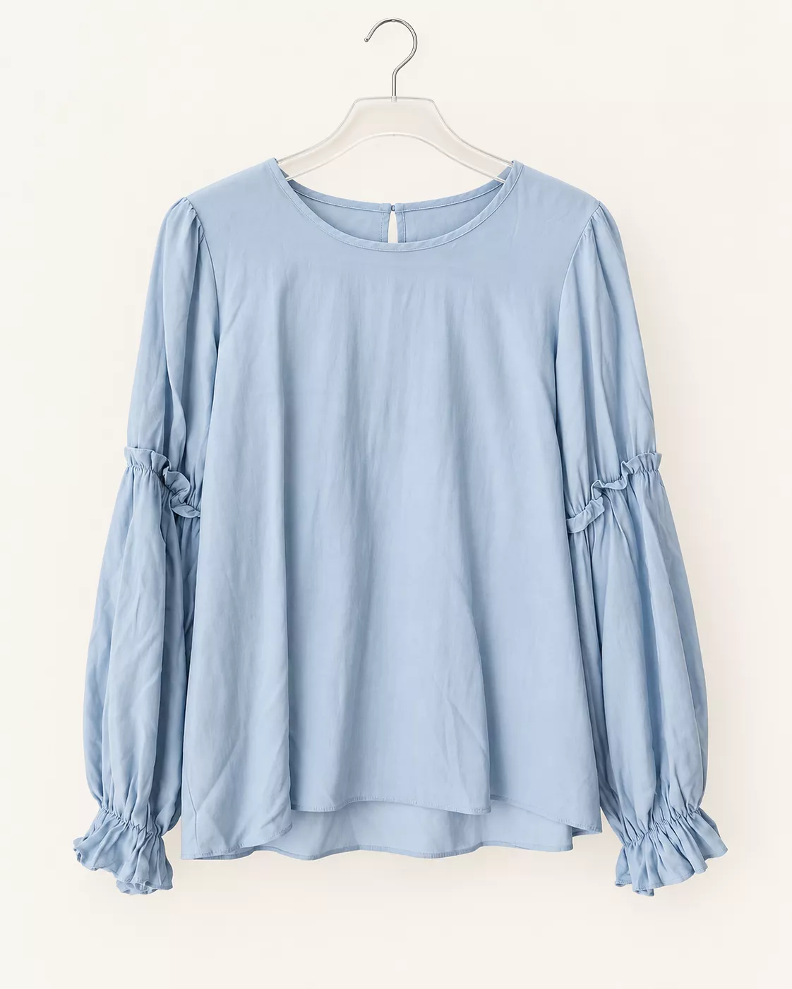 Blouse bleu ciel à manches bouffantes