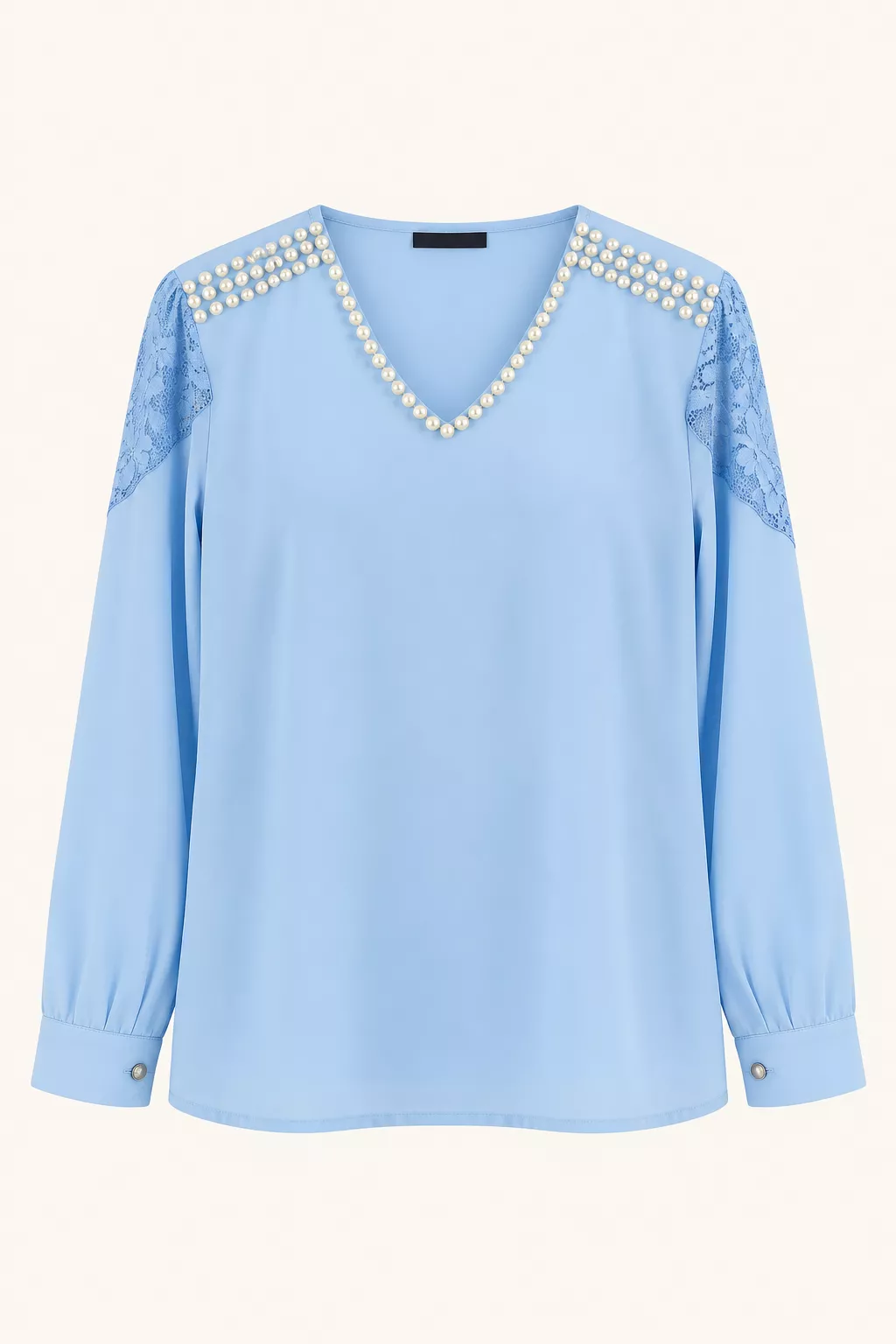 Blouse bleu ciel à perles